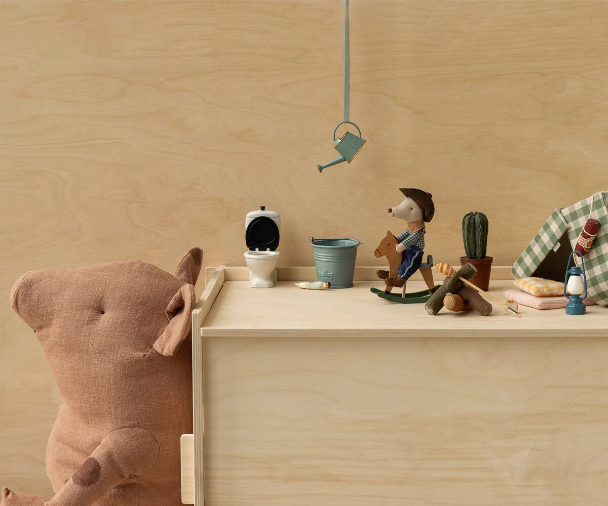 Topo cowboy sul cavallo a dondolo, Fratellino