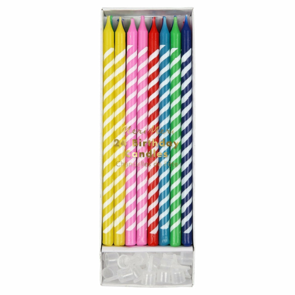 Candele con strisce colorate