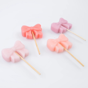C Meri Meri 275450PINK BOW 2 P.JPG Candele Pink Bow