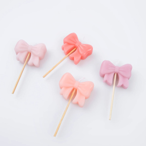 C Meri Meri 275450PINK BOW 3 P.JPG Candele Pink Bow