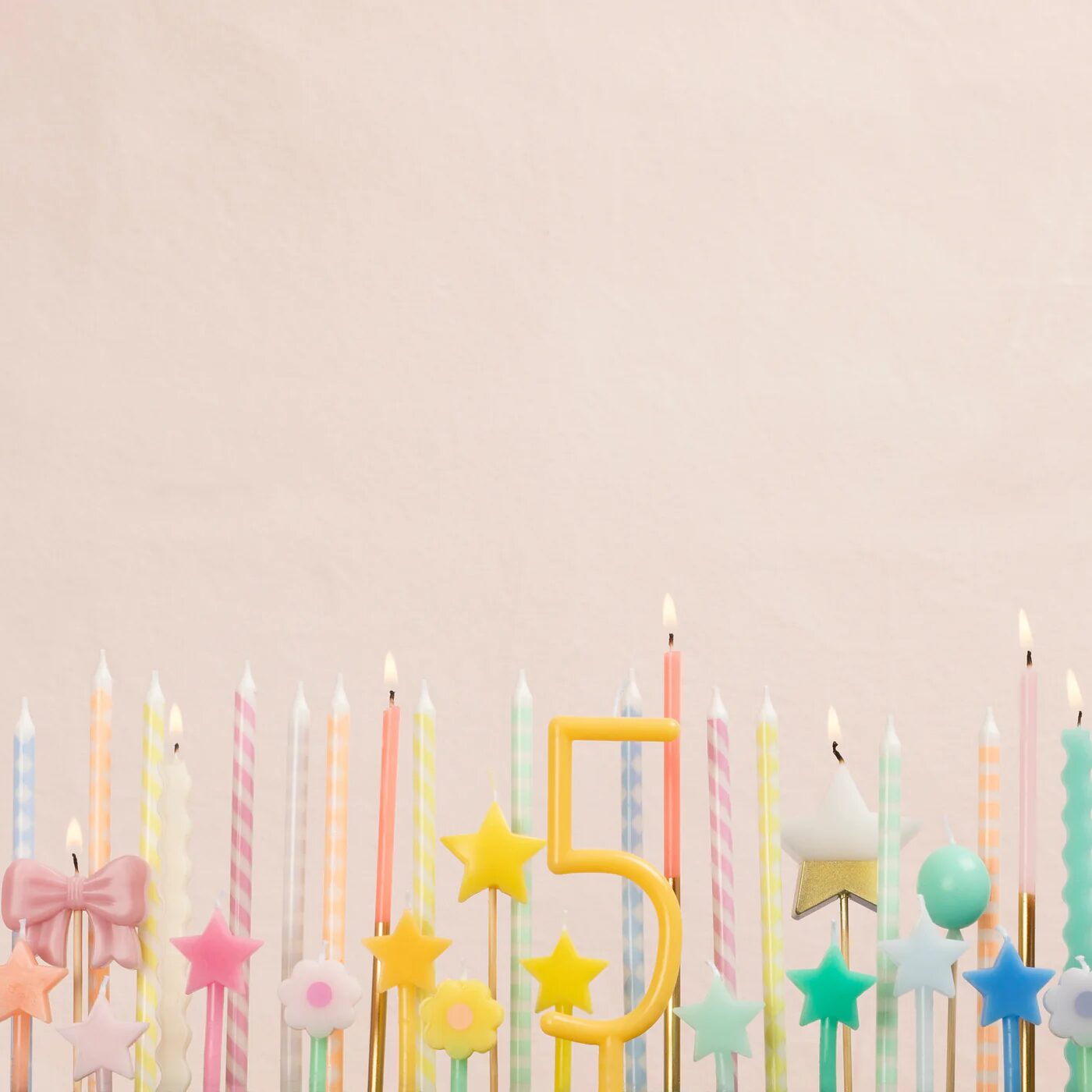 Candele a stella arcobaleno